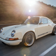 Illustration for article titled Stare At This New Gorgeous White 911 From Singer And Weep Tears Of Joy